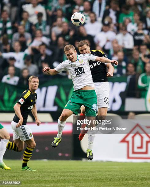 Erik Israelsson of Hammarby IF and Nils-Eric Johansson of AIK competes for the ball during the allsvenskan match between AIK and Hammarby at Friends...