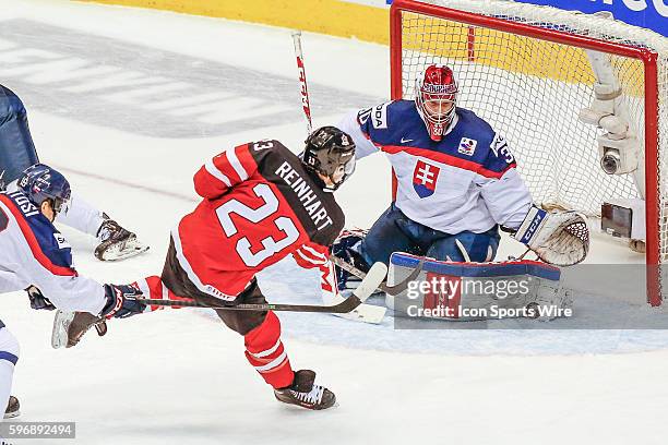Sam Reinhart of Team Canada takes shot against Denis Godla during Canada's 5-1 victory over Slovakia at the IIHF World Junior Championship at Air...