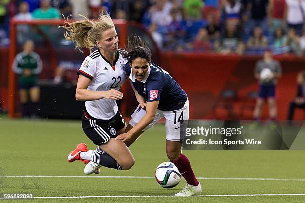 Germany midfielder Tabea Kemme collides with France midfielder Louisa Necib during the 2015 FIFA Women's World Cup Quarter final match between...