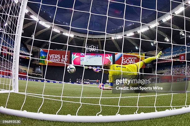 Germany goalkeeper Nadine Angerer makes a save on France midfielder Claire Lavogez during the 2015 FIFA Women's World Cup Quarter final match between...