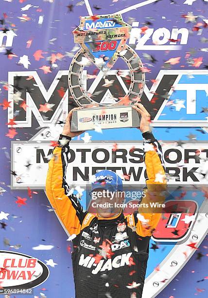 Rahal Letterman Lanigan Racing Mi-Jack Honda driver Graham Rahal holds the winners trophy over his head after winning the MAVTV 500 held at the Auto...