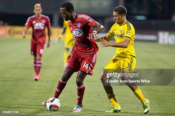 Chris Klute of the Columbus Crew SC and Atiba Harris of the FC Dallas during the game between the FC Dallas and the Columbus Crew SC held at Mapfre...