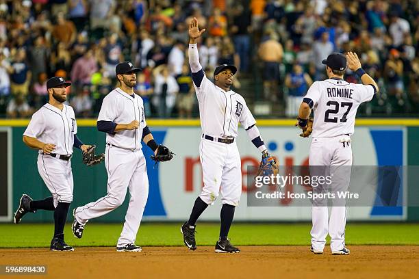 From the left, Detroit Tigers left fielder Tyler Collins , right fielder J.D. Martinez , center fielder Rajai Davis , and shortstop Andrew Romine...