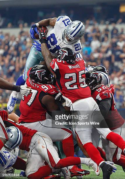 Dallas Cowboys Running Back Joseph Randle [18812] leaps over the line for a touchdown during the NFL game between the Atlanta Falcons and the Dallas...