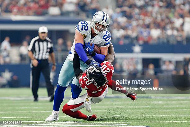 Dallas Cowboys Tight End Jason Witten [3533] runs over Atlanta Falcons Cornerback Phillip Adams [10749] during the NFL game between the Atlanta...
