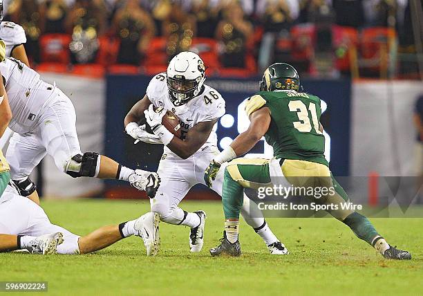 Colorado Buffaloes Running Back, Christian Powell runs the ball during the Rocky Mountain Showdown between the Colorado University Buffaloes and the...