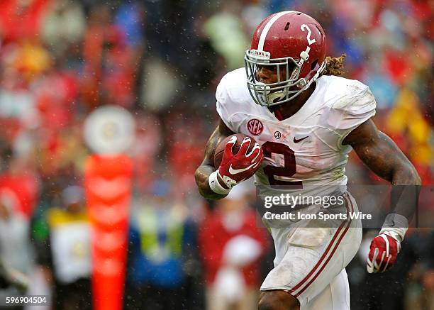 Alabama Crimson Tide running back Derrick Henry rushes for a touchdown in first half action of the Alabama Crimson Tide at Georgia Bulldogs game at...