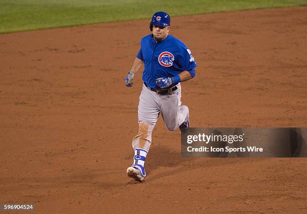 Chicago Cubs left fielder Kyle Schwarber rounds the bases after hitting a two run home run during the third inning in the National League Wild Card...