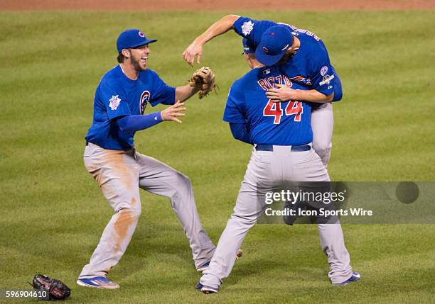 Chicago Cubs first baseman Anthony Rizzo bear hugs starting pitcher Jake Arrieta after the final out in the Chicago Cubs 4-0 win over the Pittsburgh...