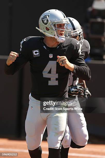 Oakland Raiders quarterback Derek Carr during action in an NFL game against the Baltimore Ravens at O.co Coliseum in Oakland, CA. The Raiders won...