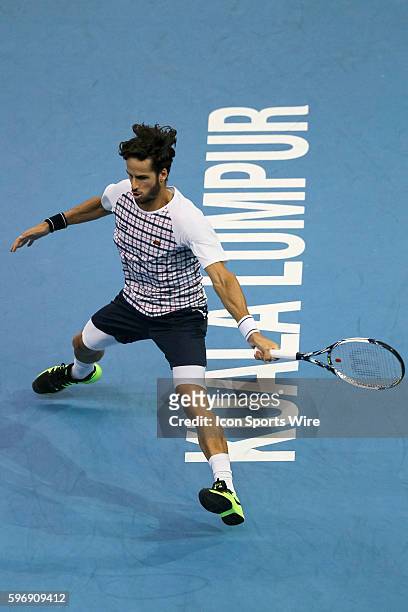 Feliciano Lopez of Spain in action during his 5-7, 5-7 lost against David Ferrer of Spain in the final match of ATP World Tour 250 Malaysian Open,...