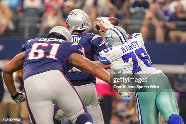 Dallas Cowboys defensive end Greg Hardy hits New England Patriots quarterback Tom Brady arm during the game between the Dallas Cowboys and the New...