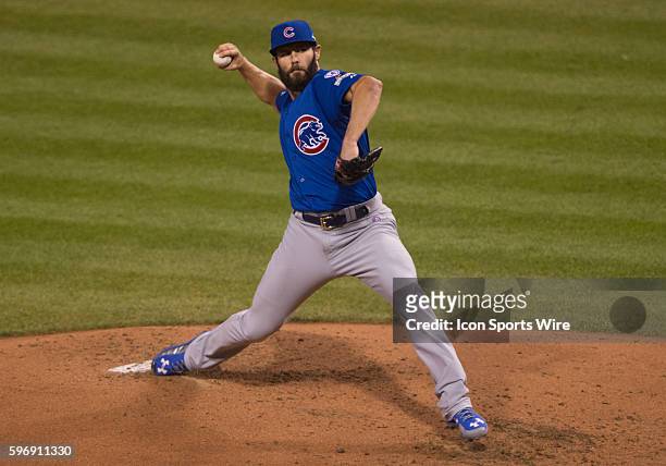 Chicago Cubs starting pitcher Jake Arrieta delivers a pitch during the first inning in the National League Wild Card game between the Chicago Cubs...