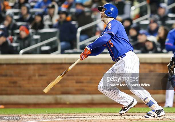 New York Mets third baseman David Wright [4650] doubles over the head of Chicago Cubs center fielder Dexter Fowler , scoring New York Mets right...
