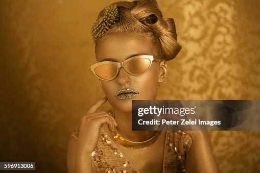 Emma_3M9A4952, Model is wearing metallic gold body paint. L…