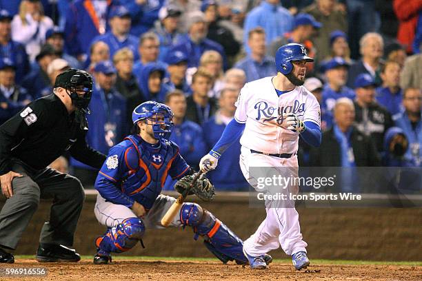 Kansas City Royals third baseman Mike Moustakas gets a base hit during a 5-4 win against the New York Mets in 15 innings of Game 1 of the World...