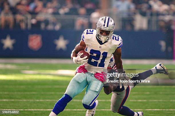 Dallas Cowboys running back Joseph Randle gets tackled by New England Patriots middle linebacker Jerod Mayo during the game between the Dallas...