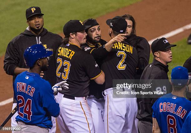 Pittsburgh Pirates first baseman Sean Rodriguez is restrained by teammates after a bench clearing altercation during the seventh inning in the...