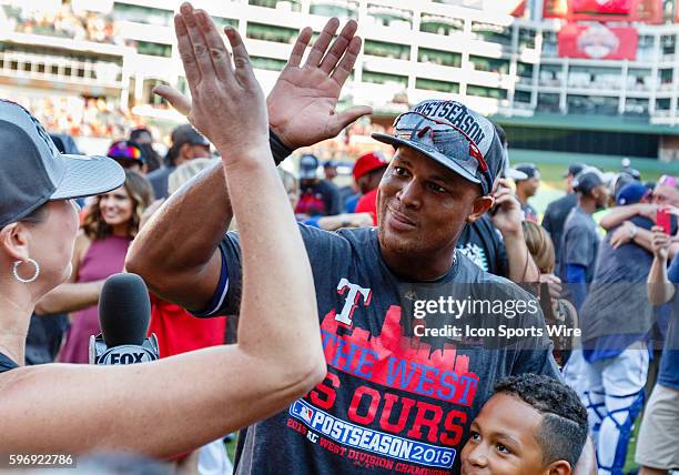 Texas Rangers Third base Adrian Beltre [1597] celebrates with Emily Jones from Fox Sports after winning the MLB game between the Los Angeles Angels...