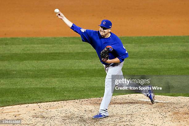 Chicago Cubs relief pitcher Trevor Cahill throws during the eighth inning of game two of baseball's National League Division Series against the St....