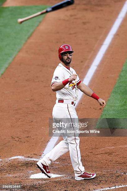 St. Louis Cardinals third baseman Matt Carpenter watches his bat fly into the stands after loosing his grip while batting during the fourth inning of...