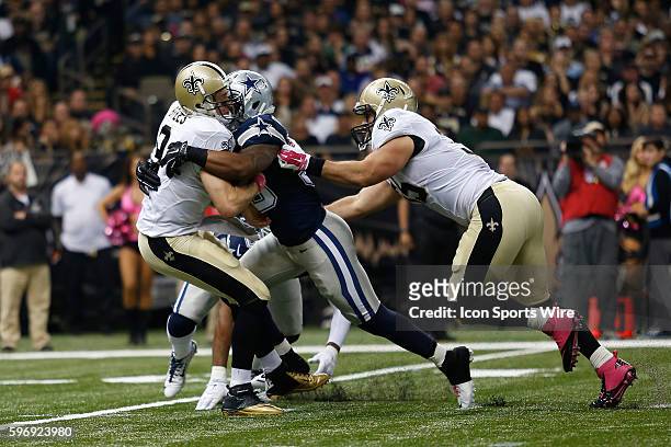 New Orleans Saints Quarterback Drew Brees is sacked by Dallas Cowboys Linebacker Anthony Hitchens at the Mercedes-Benz Superdome in New Orleans, LA.