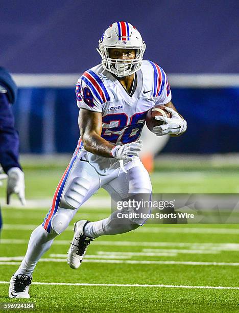 Louisiana Tech Bulldogs running back Kenneth Dixon breaks to the outside during the Louisiana Tech Bulldogs vs the Rice Owls at Rice Stadium ,...