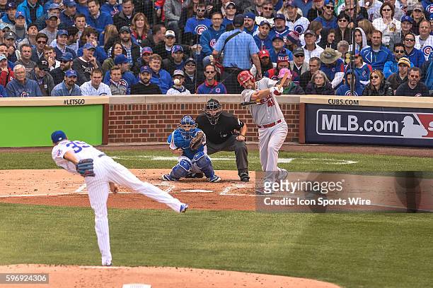 Cardinals pitcher, John Lackey, breaks his baseball bat while batting in game 4, of the NLDS, in a game between the St Louis Cardinals, and the...