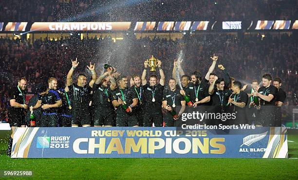 New Zealand's Richie McCaw lifts the Webb Ellis Trophy after New Zealand defeats Australia 34-17 at the 2015 Rugby World cup Championship match at...