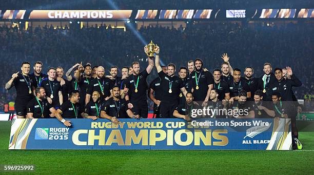 New Zealand's Richie McCaw lifts the Webb Ellis Trophy after New Zealand defeats Australia 34-17 at the 2015 Rugby World cup Championship match at...