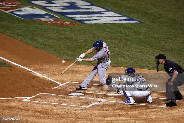 New York Mets second baseman Daniel Murphy hits a solo home run in the third inning in game 3 action of the National League Championship Series...