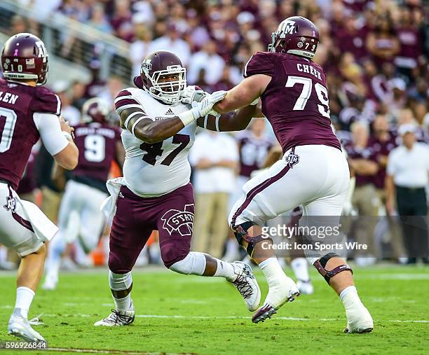 Texas A&M Aggies offensive lineman Joseph Cheek blocks Mississippi State defensive end A.J. Jefferson during the Mississippi State Bulldogs vs Texas...