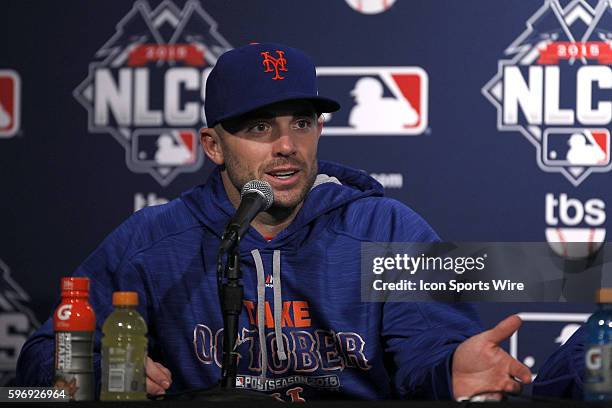 New York Mets third baseman David Wright talks to members of the media in a post game conference in game three action of the National League...