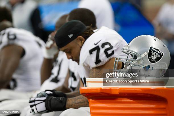 General view of the Oakland Raiders helmet with Oakland Raiders offensive lineman Donald Penn seen in the background during game action between the...