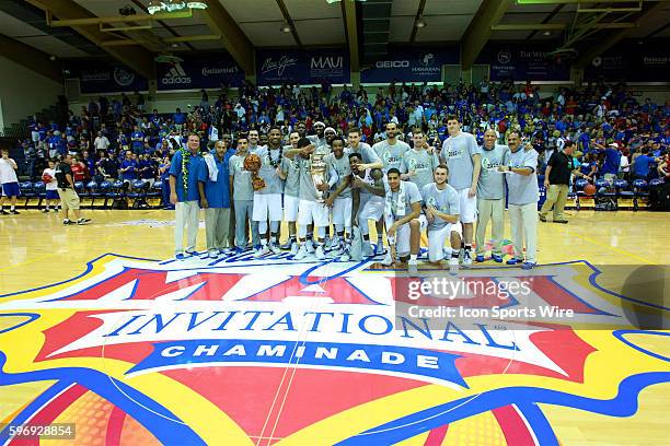 Kansas Jayhawks celebrate after their win during the Maui Invitational Championship game at Lahaina Civic Center on Maui, HI.