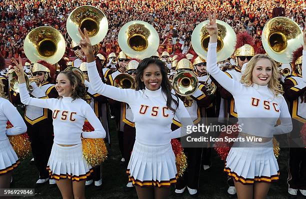 Trojans cheerleaders on the field after the Trojans defeated the UCLA Bruins 40 to 21 in a game played at the Los Angeles Memorial Coliseum in Los...