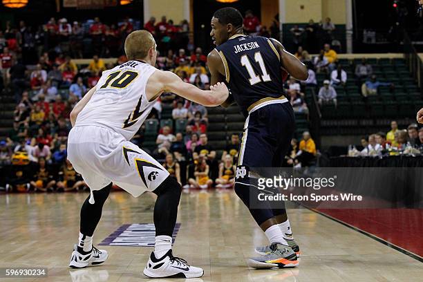 Notre Dame Fighting Irish guard Demetrius Jackson is defended by Iowa Hawkeyes guard Mike Gesell during the 2015 Advocare Invitational consolation...
