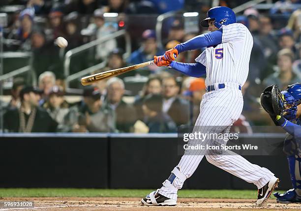 New York Mets third baseman David Wright [4650] hits a two run homer to left center field during the first inning of the Mets' 9-3 victory over the...