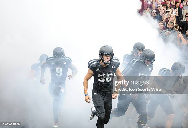 Texas A&M Aggies punter Drew Kaser enters the field from the tunnel before the South Carolina Gamecocks vs Texas A&M Aggies game at Kyle Field,...