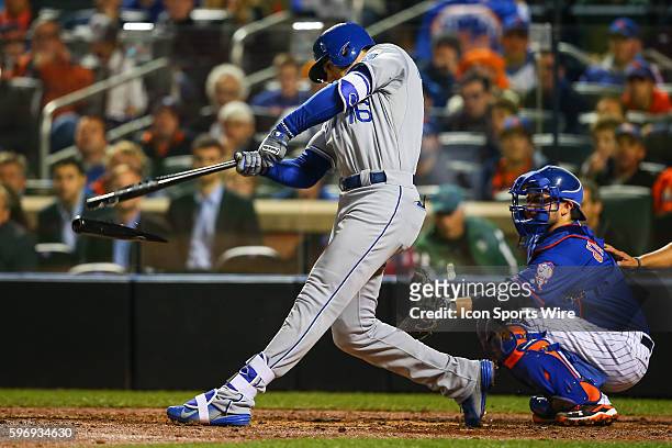 Kansas City Royals right fielder Paulo Orlando has his bat split in two in the 10th inning of Game 5 ofthe 2015 World Series between the New York...