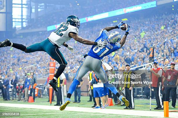 Detroit Lions wide receiver Calvin Johnson goes up high for this touchdown catch as Philadelphia Eagles cornerback Eric Rowe can't quite reach it...