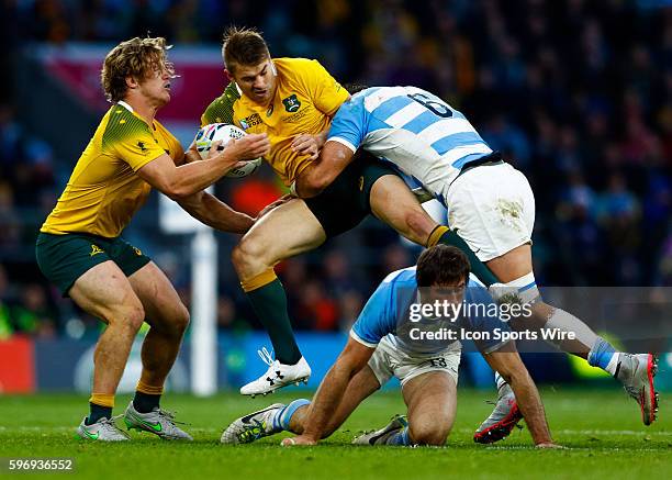 London, UK - Australia's Drew Mitchell is tackled by Argentina's Pablo Matera during the 2015 Rugby World cup Semi-Finals match-up between Argentina...