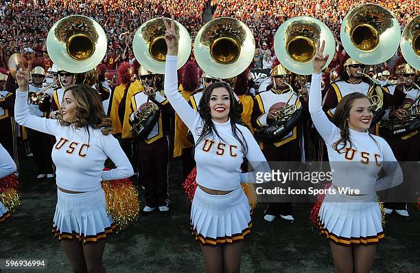 Trojans cheerleaders on the field after the Trojans defeated the UCLA Bruins 40 to 21 in a game played at the Los Angeles Memorial Coliseum in Los...