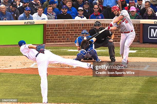 Pitcher, John Lackey batting in game 4, of the NLDS, in a game between the St Louis Cardinals, and the Chicago Cubs, at Wrigley Field, Chicago, Il....