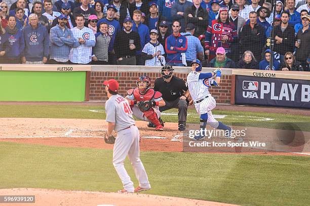 Javier Baez hits a three run homer off of John Lackey in game 4, of the NLDS, in a game between the St Louis Cardinals, and the Chicago Cubs, at...