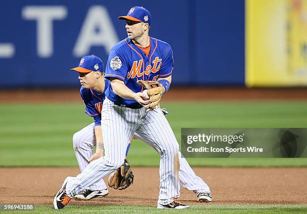 With one out and a runner on third in the top of the 9th, New York Mets third baseman David Wright [4650] cuts in front of a stunned New York Mets...