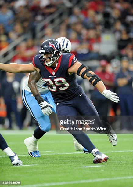Texans DE J. J. Watt gets by Jeremiah Poutasi during the Houston Texans 20-6 win over the Tennessee Titans at NRG Stadium in Houston, TX.