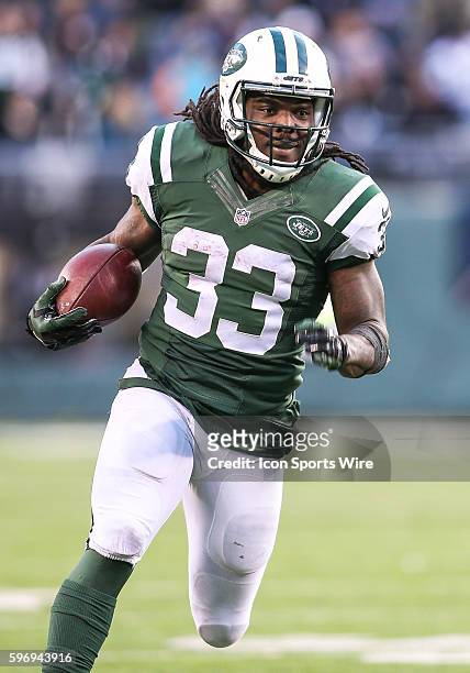 New York Jets Running Back Chris Ivory [13171] rushes 31-yards for a touchdown during the 2nd half of the game between the Miami Dolphins and The New...