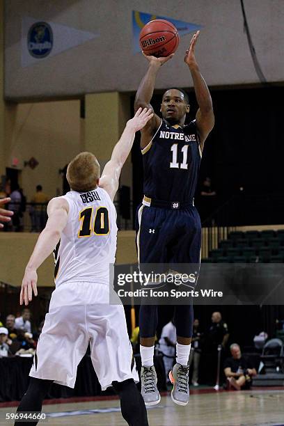 Notre Dame Fighting Irish guard Demetrius Jackson takes a jump shot over Iowa Hawkeyes guard Mike Gesell during the 2015 Advocare Invitational...