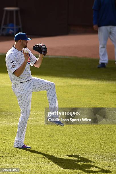 Jason Hammel playing long toss prior to pitching in game 4, of the NLDS, in a game between the St Louis Cardinals, and the Chicago Cubs, at Wrigley...